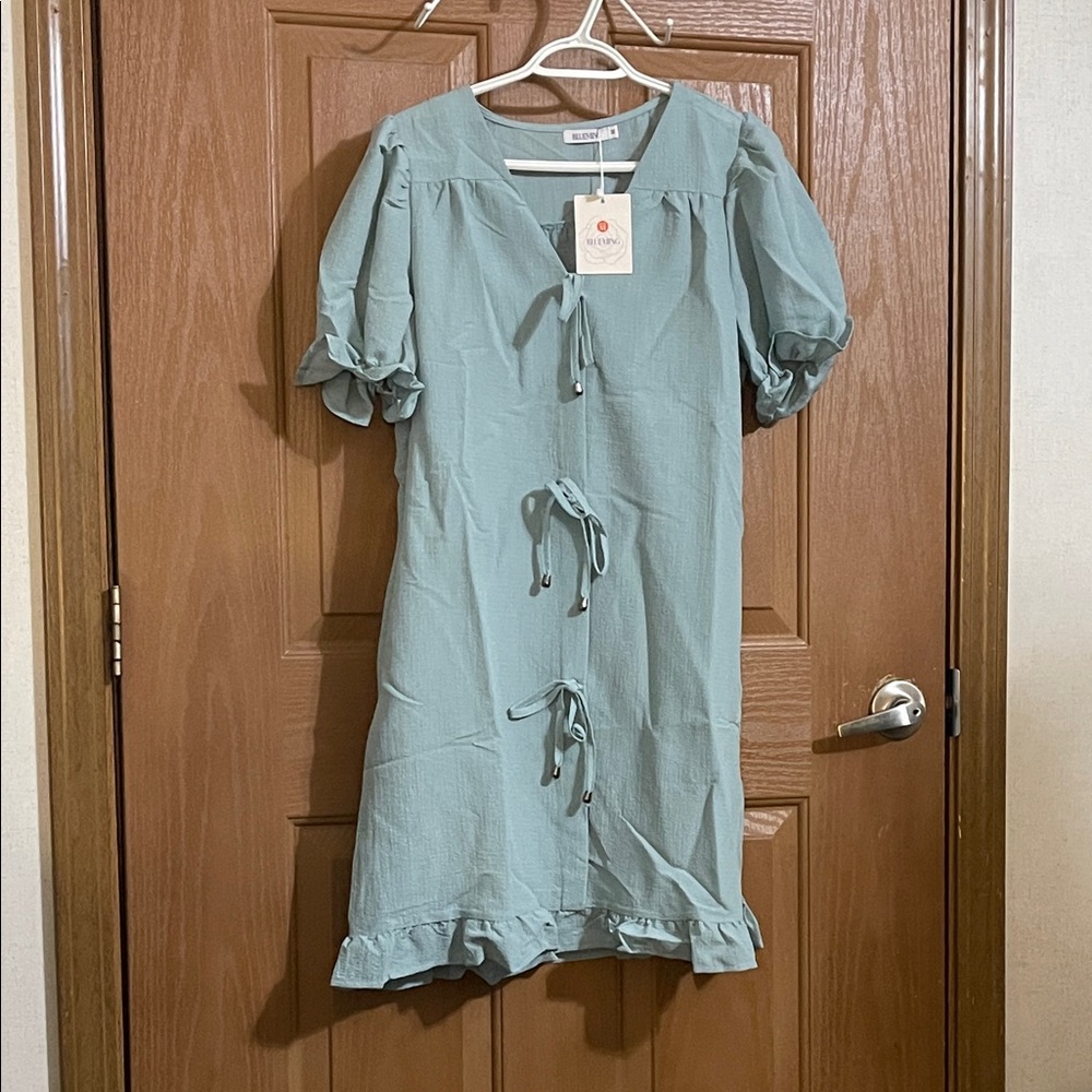 Elegant Dress in Light Blue with pockets